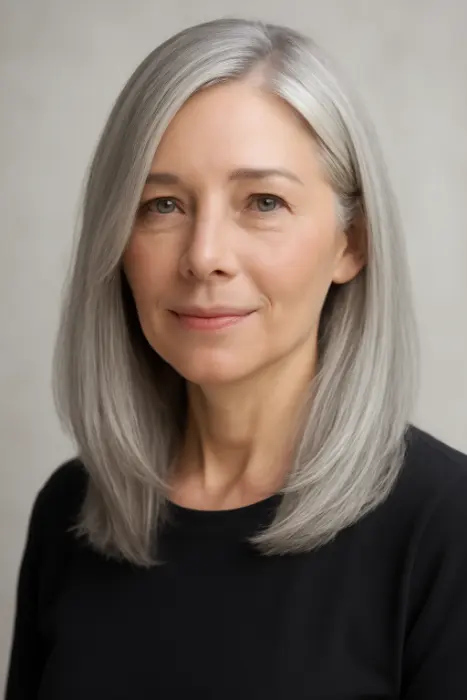 35 Hairstyles for Women Over 60 with Sleek Hair and Grace 19 Soft, Straight Silver Hair with Side Part